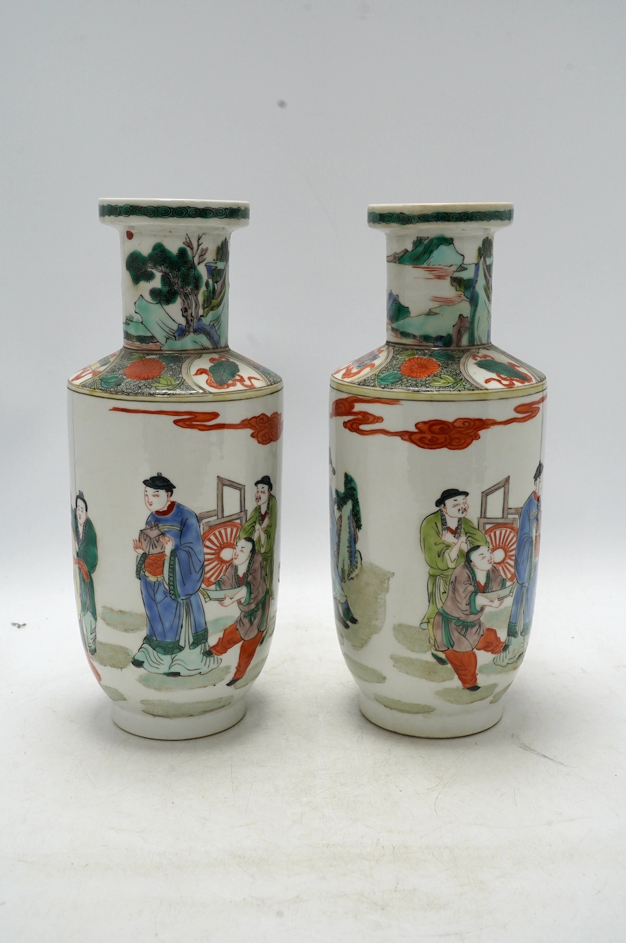 A pair of Chinese famille verte vases, hand painted with figures, 32cm high. Condition - good